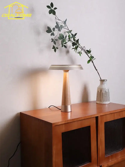 Modern brass-toned solid wood table lamp with a sleek tapered base and minimalist circular shade for bedroom decorbites ceil solid use