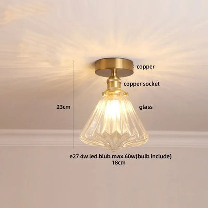 Modern nordic brass led ceiling light with diamond glass shade and warm illumination for bedroom use