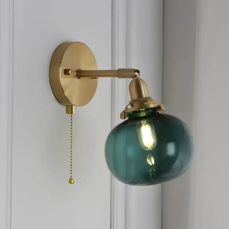 Teal glass ball wall sconce with brass hardware and pull chain switch modern nordic decorbites glass ball lamp