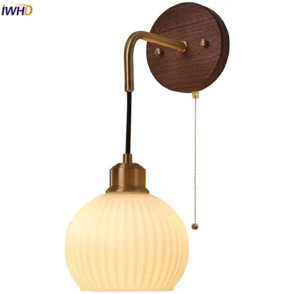 Modern nordic copper adjustable led wall light with warm-toned ribbed glass globe and brass arm for bedroom decorbites copper adjustable