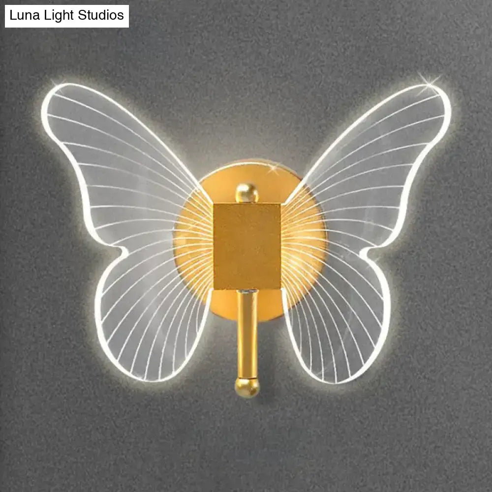 Modern nordic gold led butterfly wall lamp with translucent wings outlined in glowing white led light for bedroom use