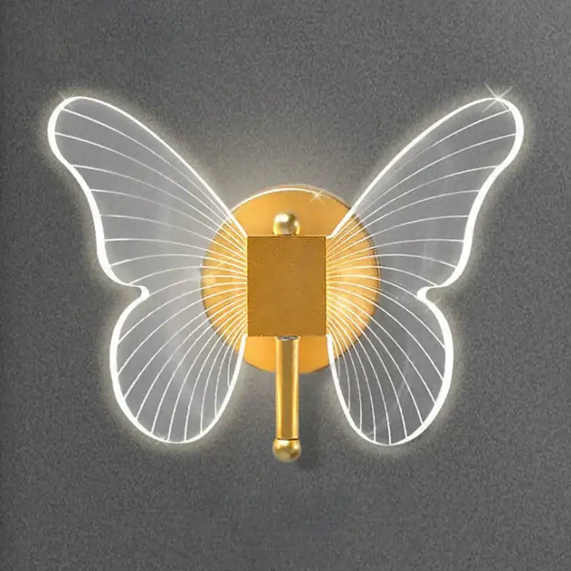Modern nordic gold led butterfly wall lamp with gold-toned copper led butterfly wings outlined in glowing white light