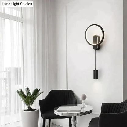Modern nordic led wall lamp in black gold with a sleek circular wall sconce and hanging cylindrical pendant design