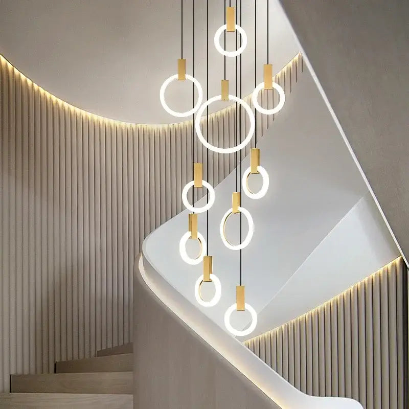 Modern nordic led wood stair chandelier with gold-toned metal accents and glowing white rings for living room decorbites led wood