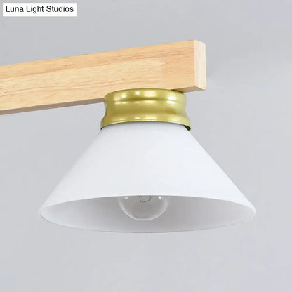 Decorbites™ nordic linear wood hanging light with white conical glass lampshade and brass metal collar mounted on wood beam