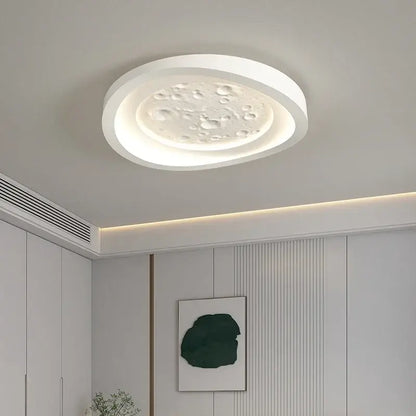 Modern nordic white led ceiling lamp with textured moon surface featuring raised bumps for bedroom lighting