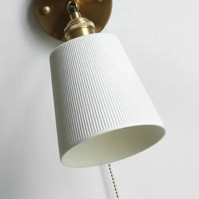 Modern nordic white ceramic wall light with brass hardware and adjustable arm for bedroom decorbites ceramic wall lights