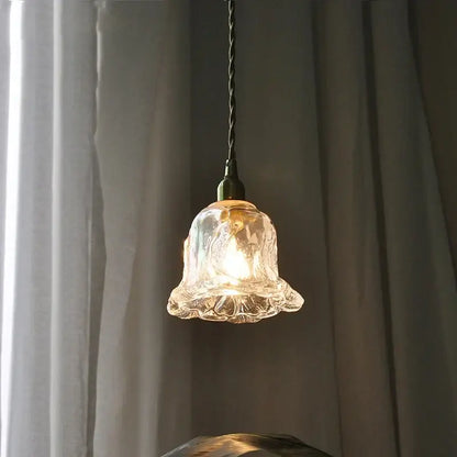 Clear hand-blown glass bell-shaped pendant lamp with textured fluted design and brass fixture for decorbites copper glass led lighting