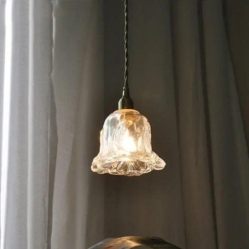 Clear hand-blown glass bell-shaped pendant lamp with textured fluted design and brass fixture for decorbites copper glass led lighting