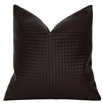 Black woven pillow cover with textured interlaced pattern complementing decorbites geometric faux leather decor