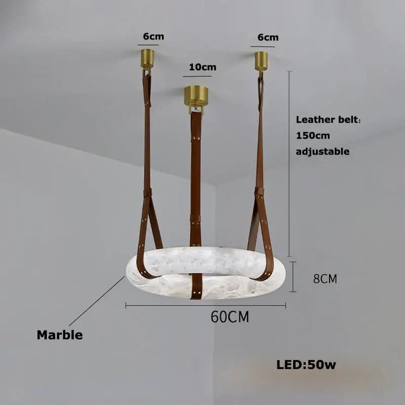 Modern opal glass ring marble chandelier with white marble pendant light, brown leather straps, and gold hardware decorbites classic ring
