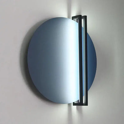 Modern orange and black circular wall lamp featuring a blue circular wall sconce with a sleek black frame by decorbites circular wall lamp
