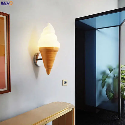 Cream-colored cone-shaped ice cream led wall sconce with glossy finish and ridges for kids bedroom decorbites ice cream