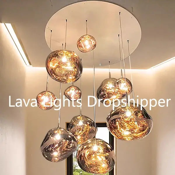 Modern organic form pendant light trio with golden spherical glass and chrome plated finish for kitchen use