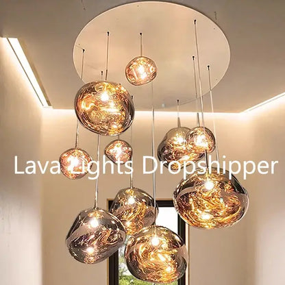 Modern organic form pendant light trio with golden spherical glass and chrome plated finish for kitchen use