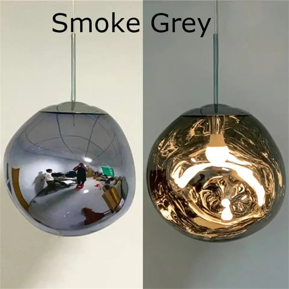 Modern organic form pendant light trio with smoke grey and gold metallic plated finish and reflective surfaces
