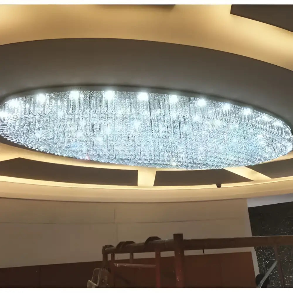 Modern oval chrome and gold crystal ceiling light with sparkling droplets for dining room decorbites crystal dining
