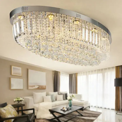A modern oval chrome ceiling light with clear crystal prisms for dining room decorbites crystal dining use