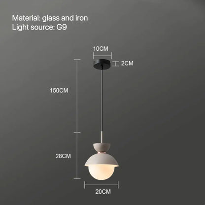 Minimalist pendant lamp with frosted glass ball and matte iron fixture designed for modern interiors decorbites glass ball