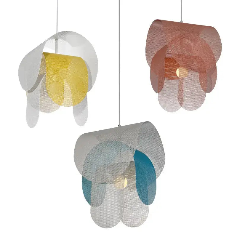 Three modern pendant lights with layered pastel mesh fishing net shades in yellow rose gold and teal for decorbites kids room