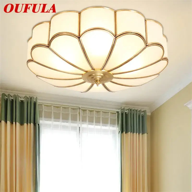 Modern petal brass ceiling lamp featuring gold-toned petals frosted glass and a central decorbites brass fixture
