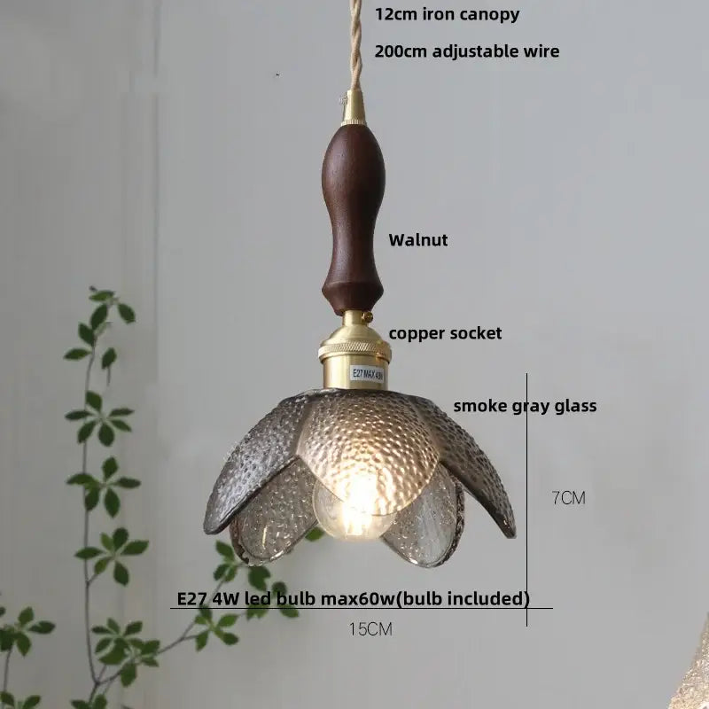 Modern petal clear glass led pendant lamp with smoke gray glass petals, walnut iron canopy, and brass copper socket perfect for dining room decorbites clear glass design