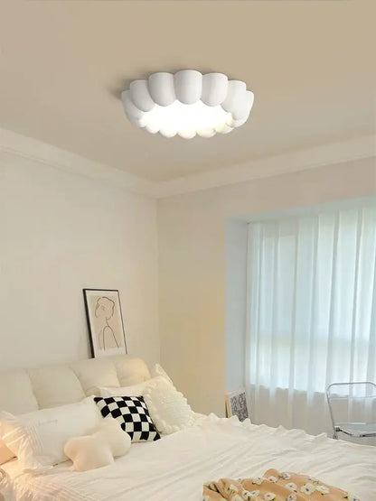 Modern petal cream wind ceiling lights featuring a white cloud-shaped design with a soft glow for cream wind bedroom decorbites