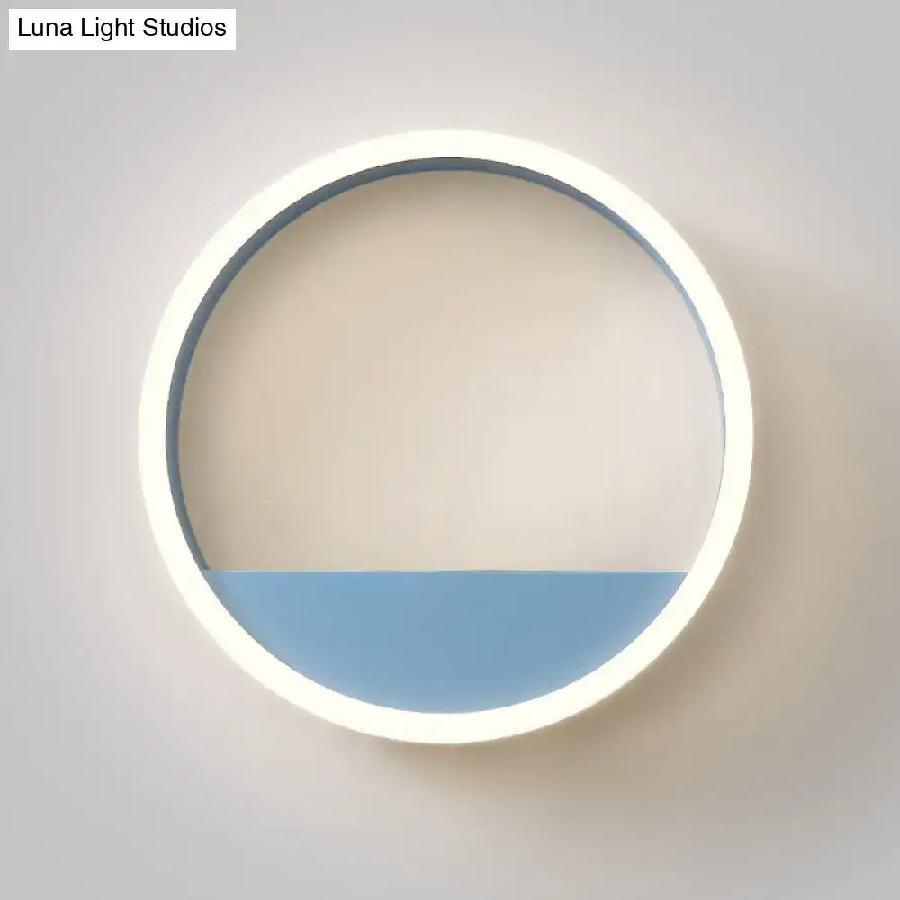 Modern pink blue iron hoop wall light with circular white frame and soft blue illuminated lower half for bedroom storage