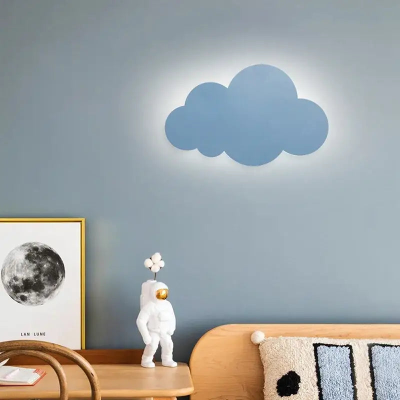 A soft blue decorbites cloud wall light with a glowing halo effect perfect for modern bedroom led decor