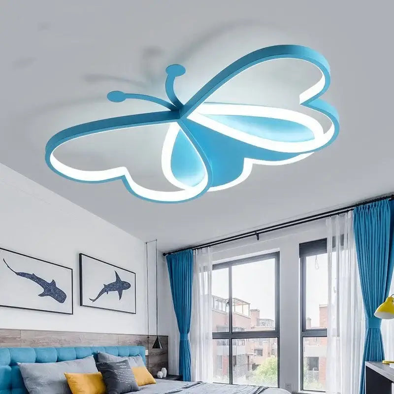 Modern pink decorbites butterfly led ceiling light with illuminated blue wings and sleek minimalist design for girls bedroom