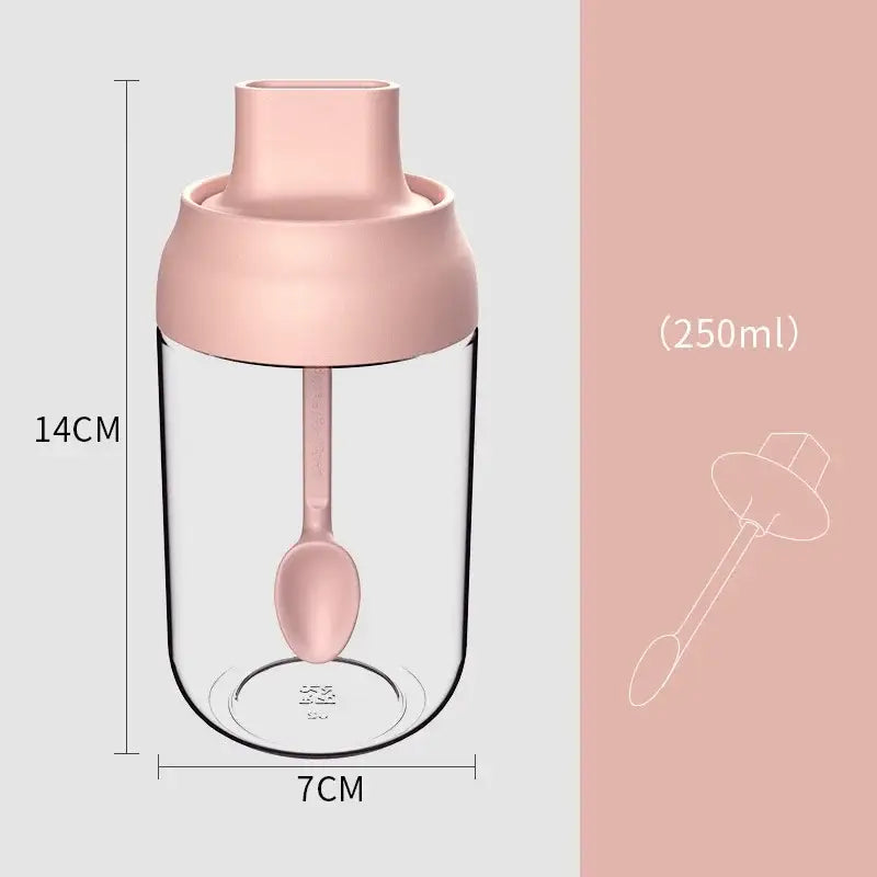 Modern pink glass seasoning bottle set with 250ml transparent bottle, silicone lid, and matching spoon for kitchen storage