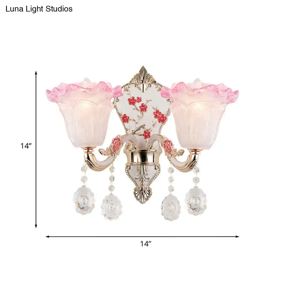 Elegant pink and white ruffle glass sconce lamp with gold metal accents and crystal pendants for modern wall lighting