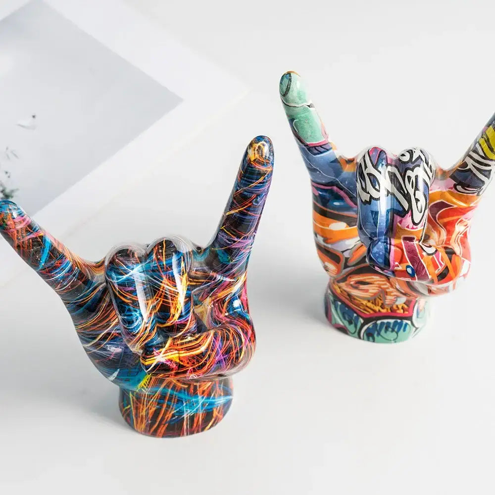 Vibrant glossy resin hand statue with modern pop art graffiti swirls and bold colors for living room decor