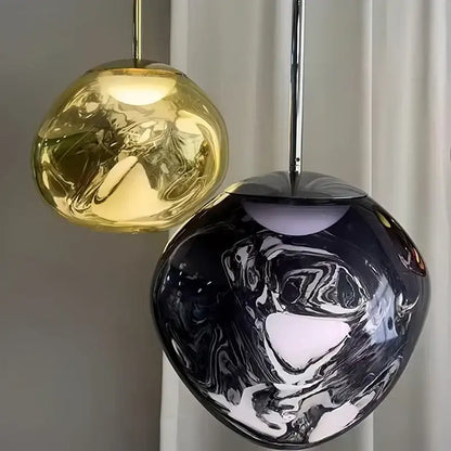 Modern purple lava pendant light with golden and black marbled glass and polished chrome finish for kitchen decor