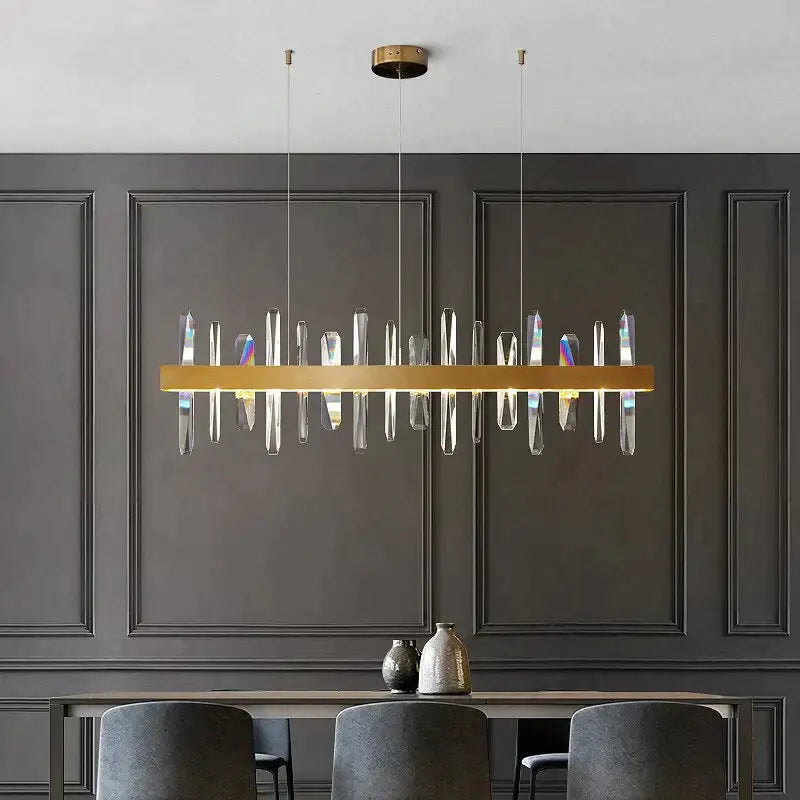 Modern rectangle gold crystal chandelier with clear prisms in a linear design by DecorBites™ Kyala collection