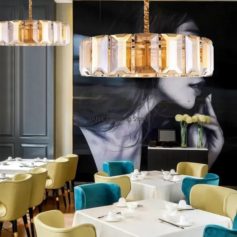 Modern rectangular black crystal chandelier with gold-toned frame and faceted crystal segments for dining room decorbites crystal chandeliers