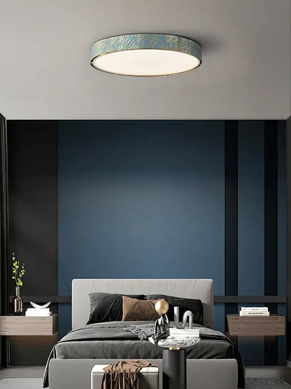 Modern rectangular blue copper crystal led chandelier with circular ceiling light and textured iridescent blue silver finish