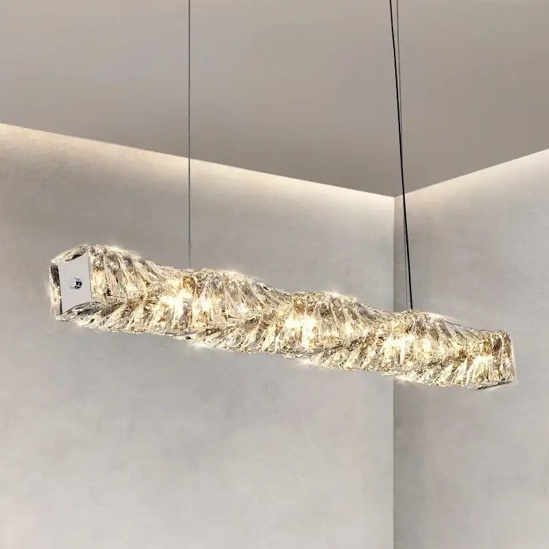 Modern rectangular elegant crystal pendant light with textured mountain design and warm led lighting for dining room decorbites elegant crystal pendant