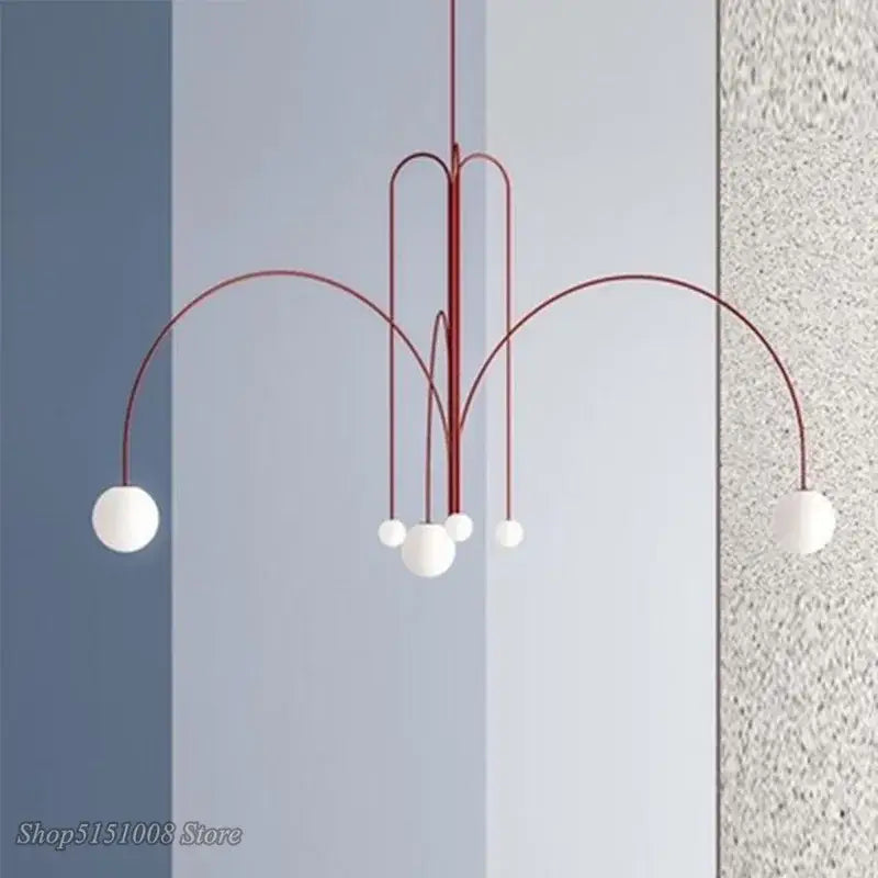 Modern red and white branch glass pendant lights featuring curved arms and spherical glass globes for living room decor