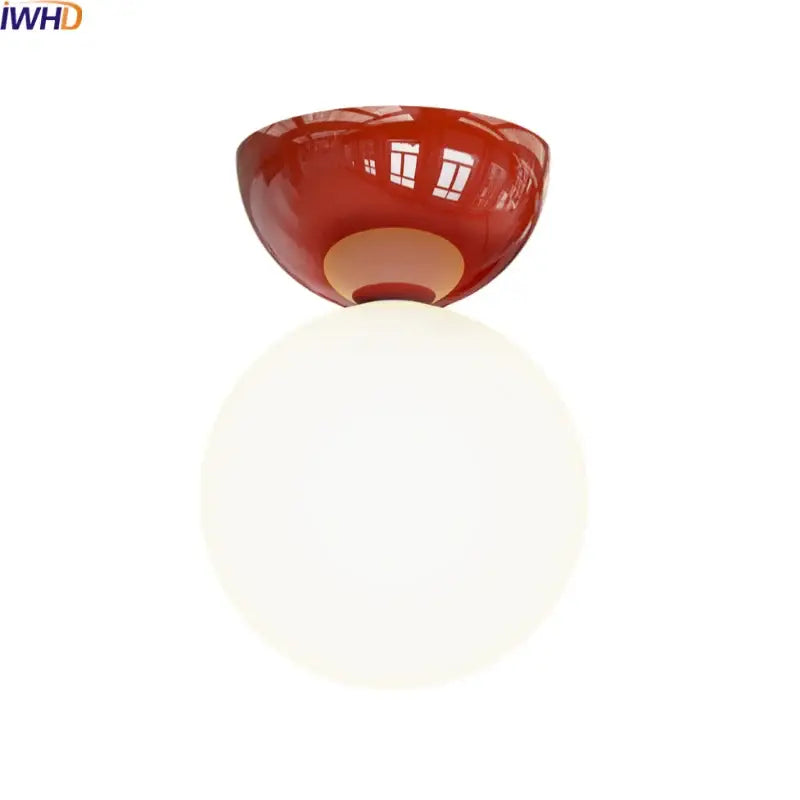 Modern red and white iron glass led ceiling lights featuring a red glossy ceramic base and white spherical glass globe by decorbites