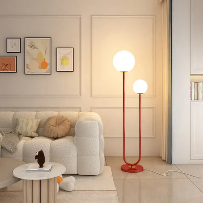 Modern red and white metal floor lamp with dual spherical glass shades for living room decorbites black white metal style