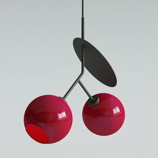 Modern red glass cherry led pendant light with glossy spheres and matte black metal stem for dining room decorbites cherry led