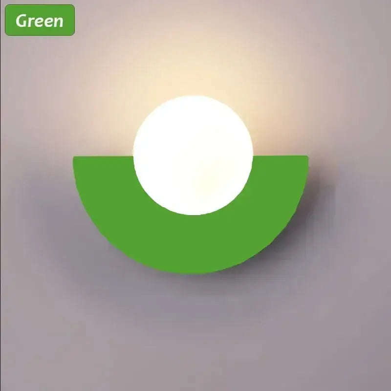 Green semi-circular wall lamp with a glowing white glass ball led fixture from decorbites glass ball collection