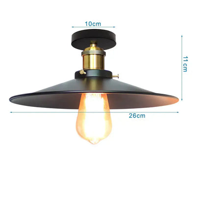 Black metal industrial-style ceiling light with brass fixture and exposed edison bulb for kitchen decorbites iron cage ceiling