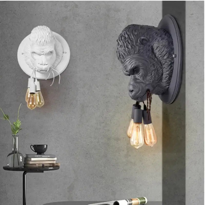 Modern retro dark gray gorilla resin wall lamp with textured fur and three exposed filament bulbs for bedroom decorbites gorilla resin wall
