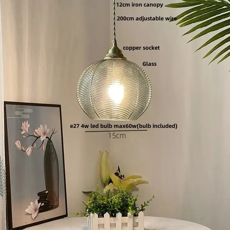 Modern ribbed blue glass led pendant lamp with textured surface and antique brass socket for dining room lighting decorbites blue glass