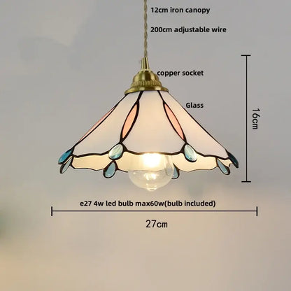 Modern ribbed blue glass led pendant light featuring a delicate tiffany-style stained glass shade with teal accents