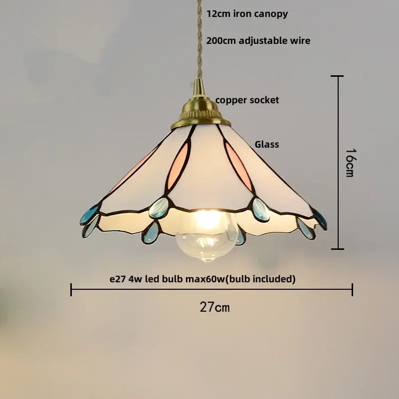 Modern ribbed blue glass led pendant light featuring a delicate tiffany-style stained glass shade with teal accents