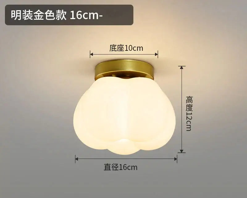 A modern decorbites ceramic glass chandelier with a frosted white ribbed glass and brass base for living room decor