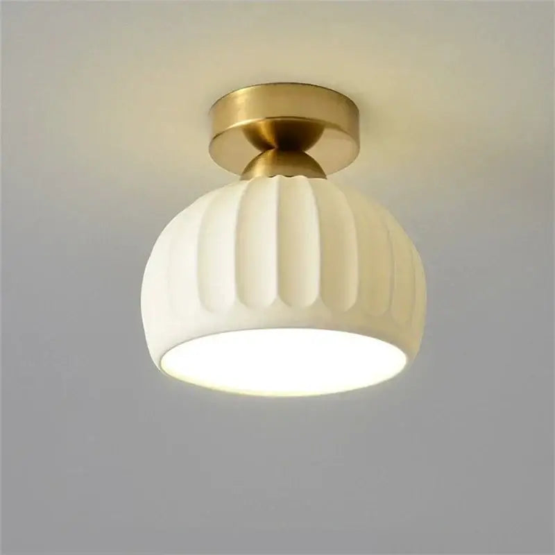 Modern ribbed ceramic glass chandelier with white globe and brass finish for living room by decorbites ceramic glass